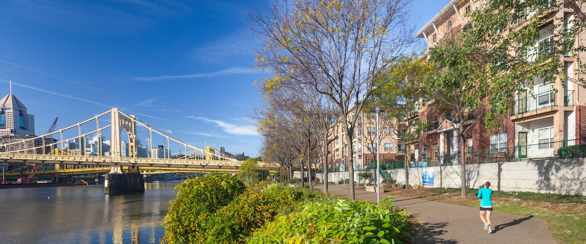 North Shore featuring a bridge and a river or creek