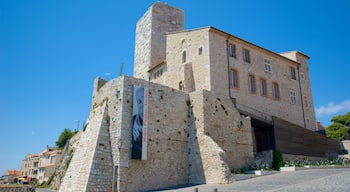 Antibes Old Town which includes heritage architecture and signage