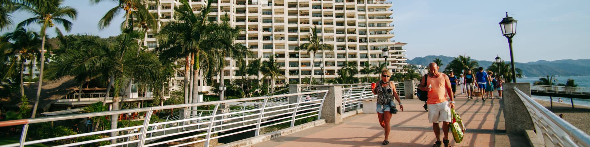 Cabo Corrientes featuring a bridge as well as a couple