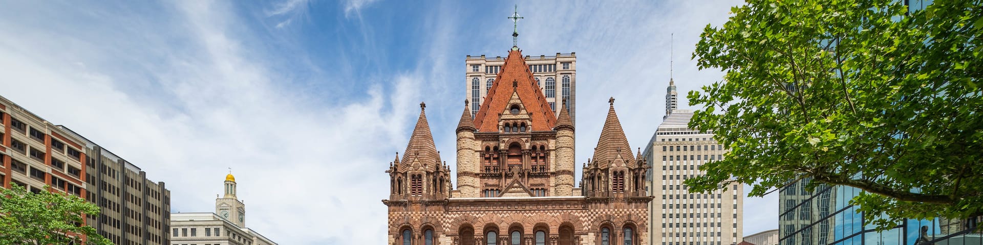 Trinity Church Boston showing heritage architecture, a city and a garden