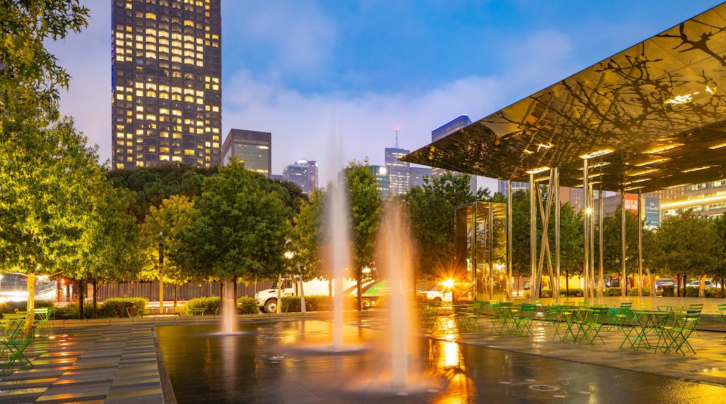 Klyde Warren Park featuring night scenes and a fountain