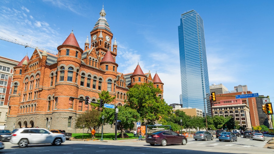 Dallas which includes a skyscraper and heritage architecture