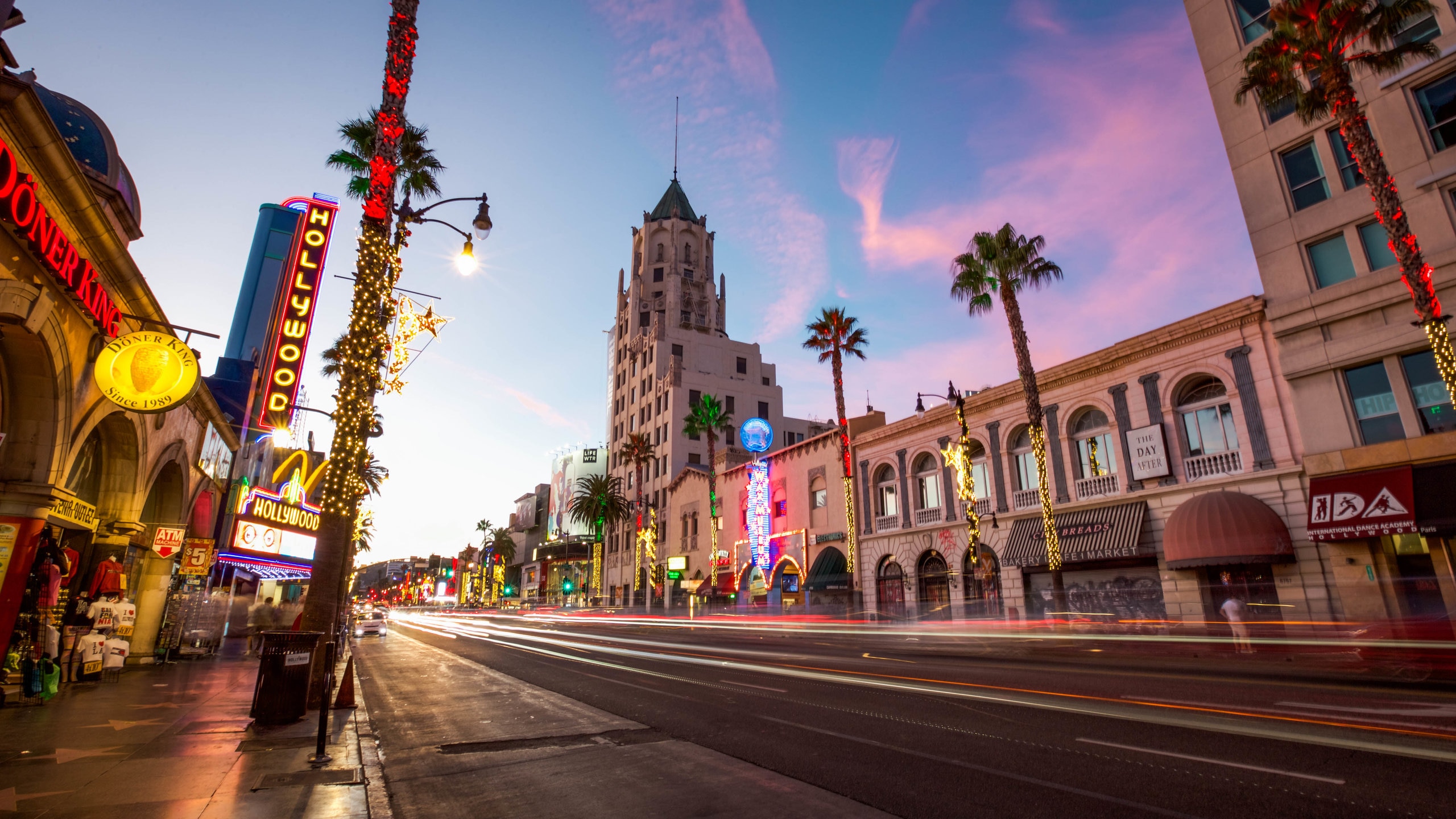 Hollywood featuring a sunset, a city and street scenes