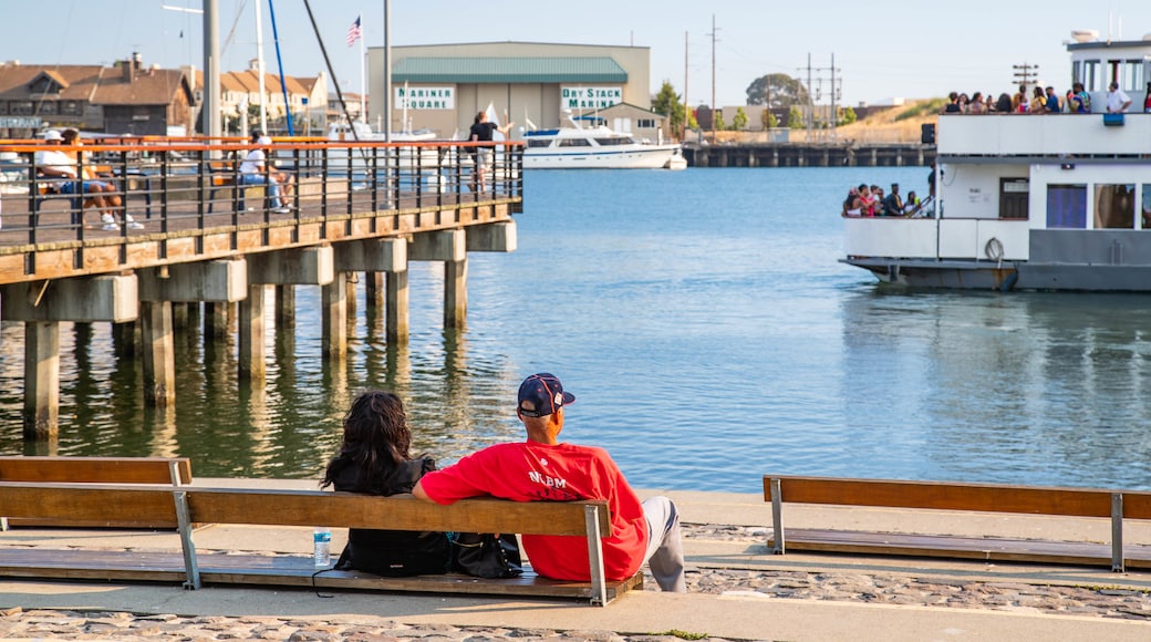 Jack London Square which includes a bay or harbor as well as a couple