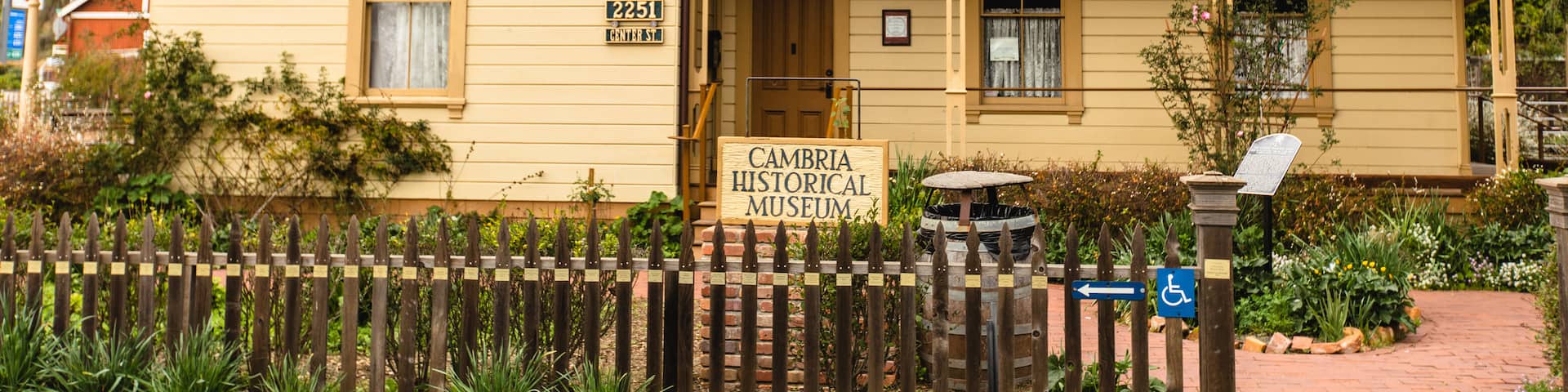 Cambria’s Historical Museum showing heritage elements, signage and a house