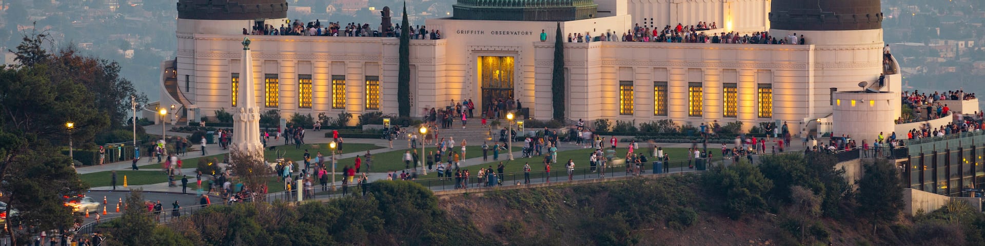 Griffith Observatory showing a city, an observatory and landscape views