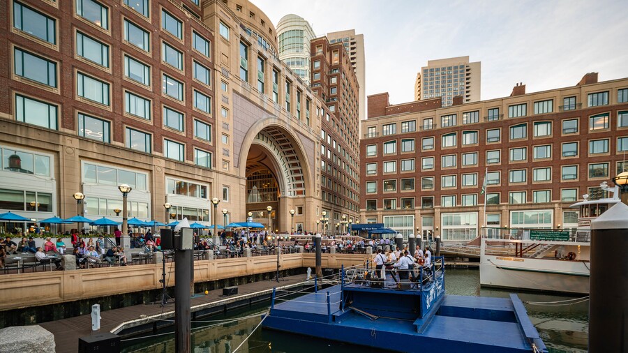 Waterfront view of Boston's North End with historic buildings and dining areas.