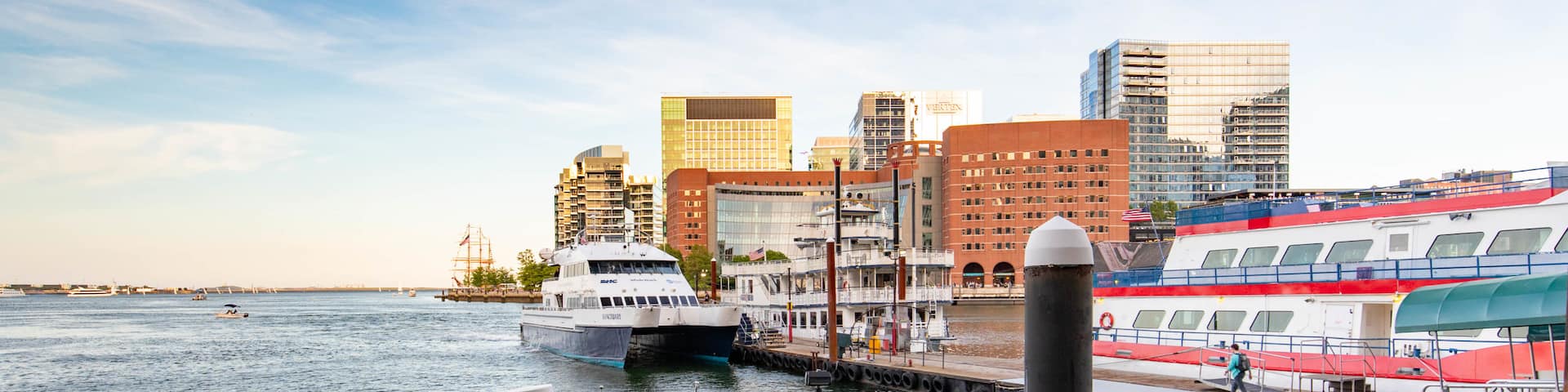 Boston Harbor showing a sunset and a bay or harbor