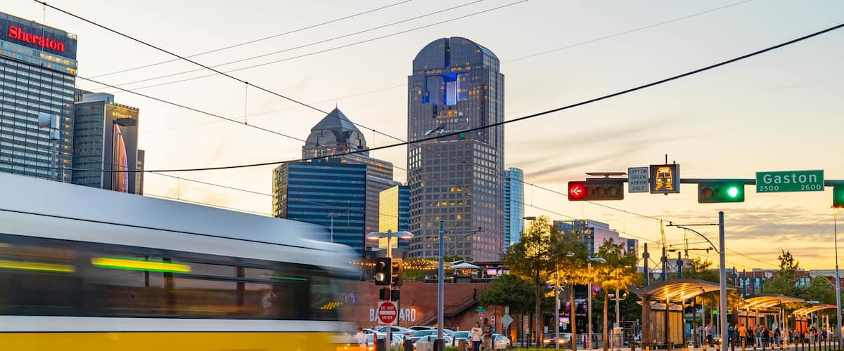 Deep Ellum which includes a city and a sunset