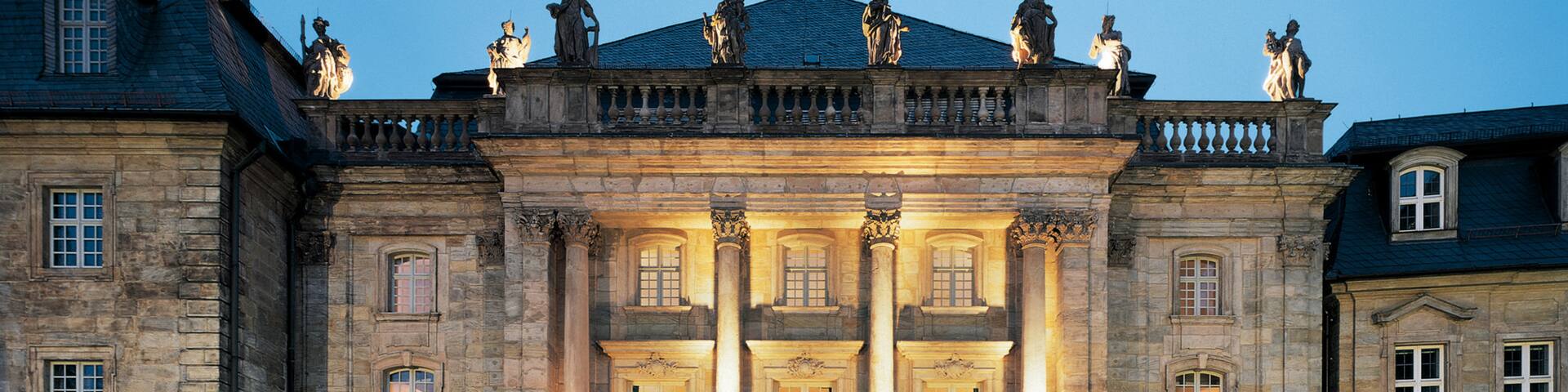 Margrave\'s Opera House which includes heritage architecture and night scenes