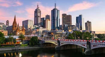 Southbank featuring a bridge, a sunset and a river or creek