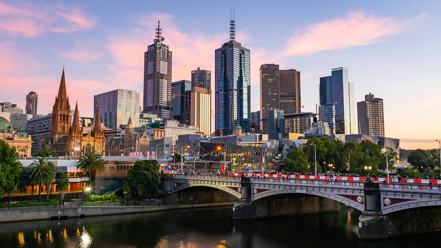 Southbank featuring a bridge, a sunset and a river or creek