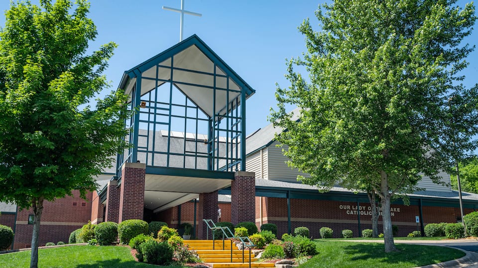 Our Lady of the Lake Catholic Church featuring a church or cathedral