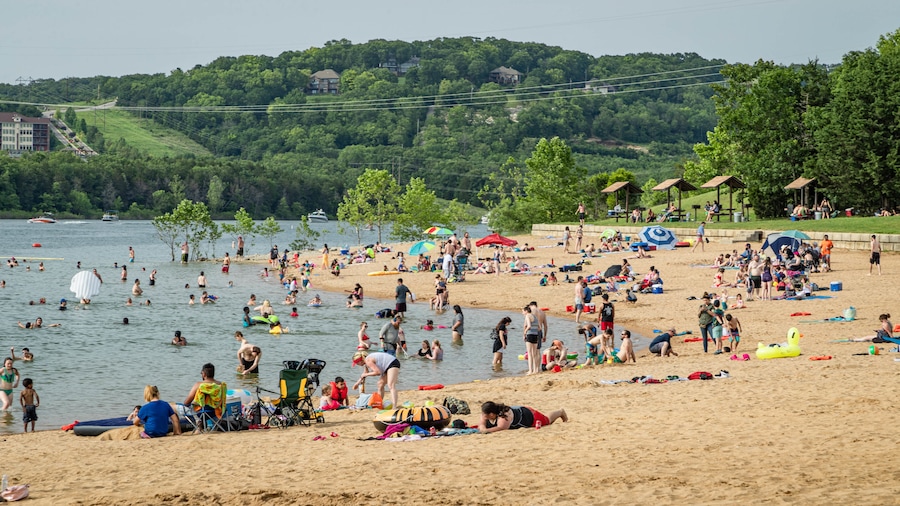 Moonshine Beach which includes swimming, a sandy beach and general coastal views