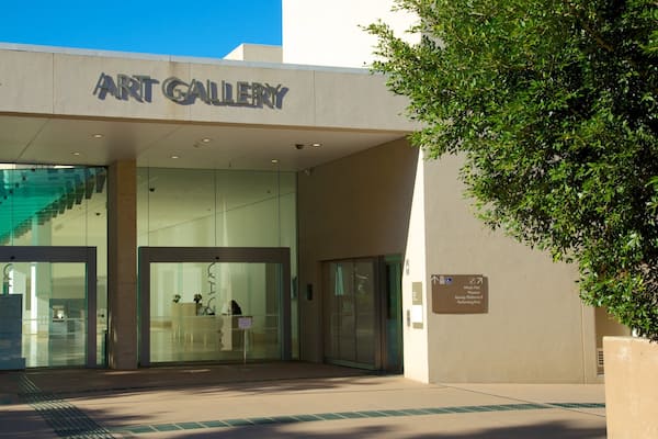 Queensland Art Gallery showing a city, art and signage