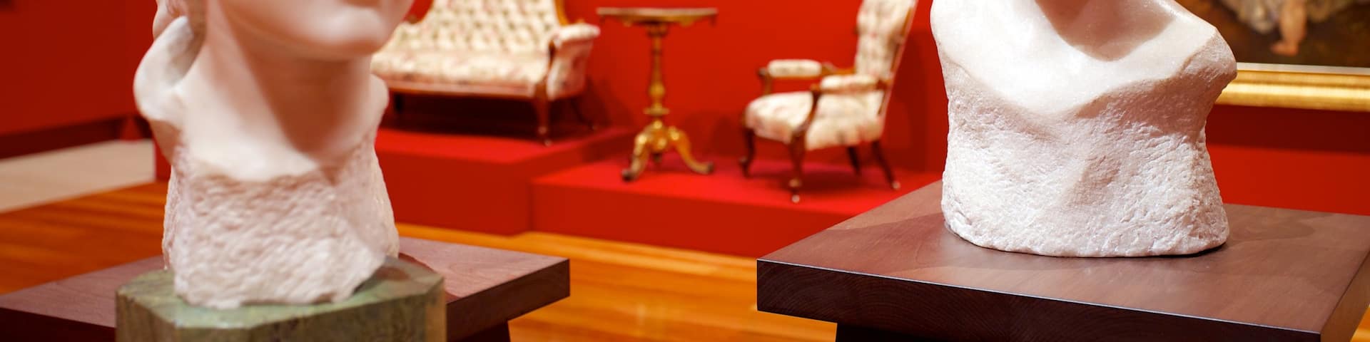 Queensland Art Gallery which includes interior views and a statue or sculpture