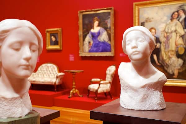 Queensland Art Gallery showing a statue or sculpture and interior views
