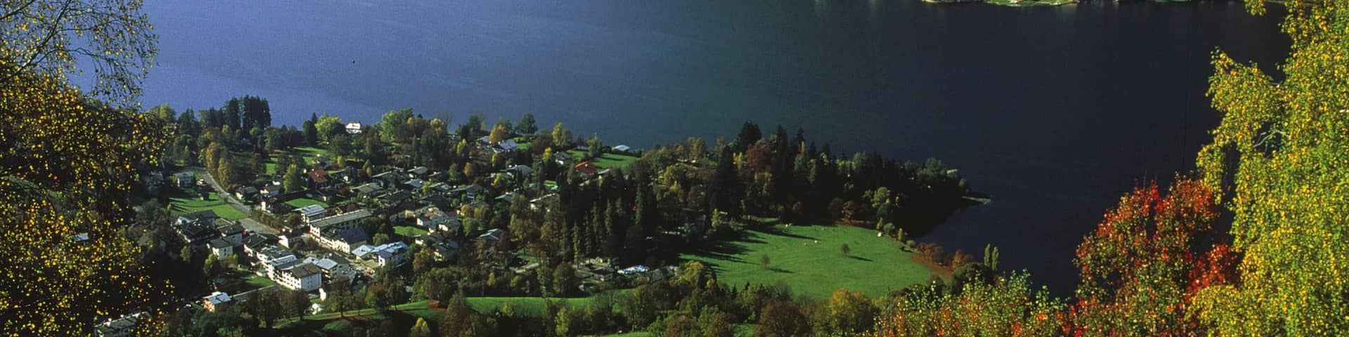 Zell am See which includes mountains, a lake or waterhole and landscape views
