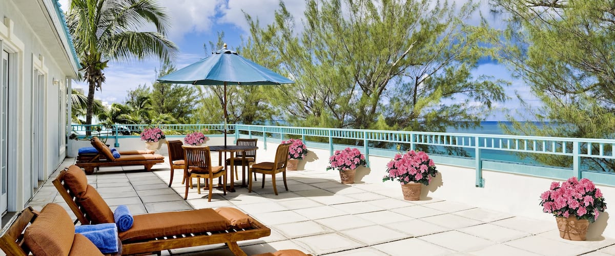 Cayman Islands featuring a luxury hotel or resort and tropical scenes