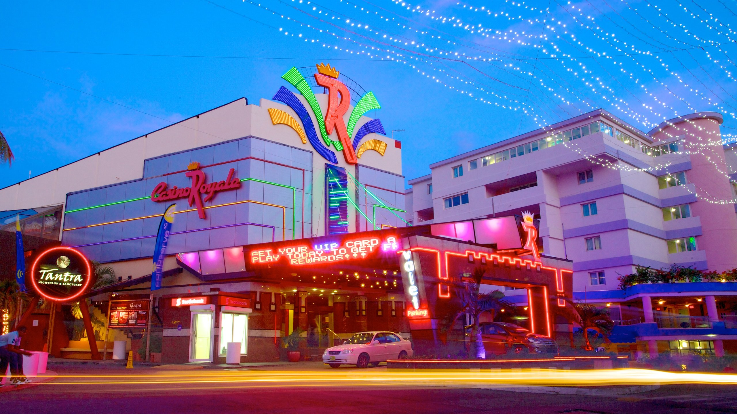 Casino Royale showing a casino, a city and signage