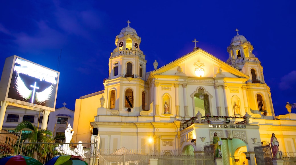 Quiapo Church featuring night scenes, a city and religious elements