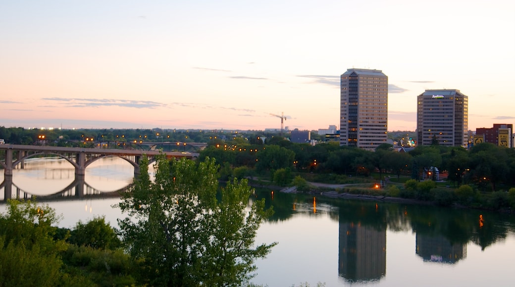 Saskatoon which includes a sunset, a bridge and a river or creek