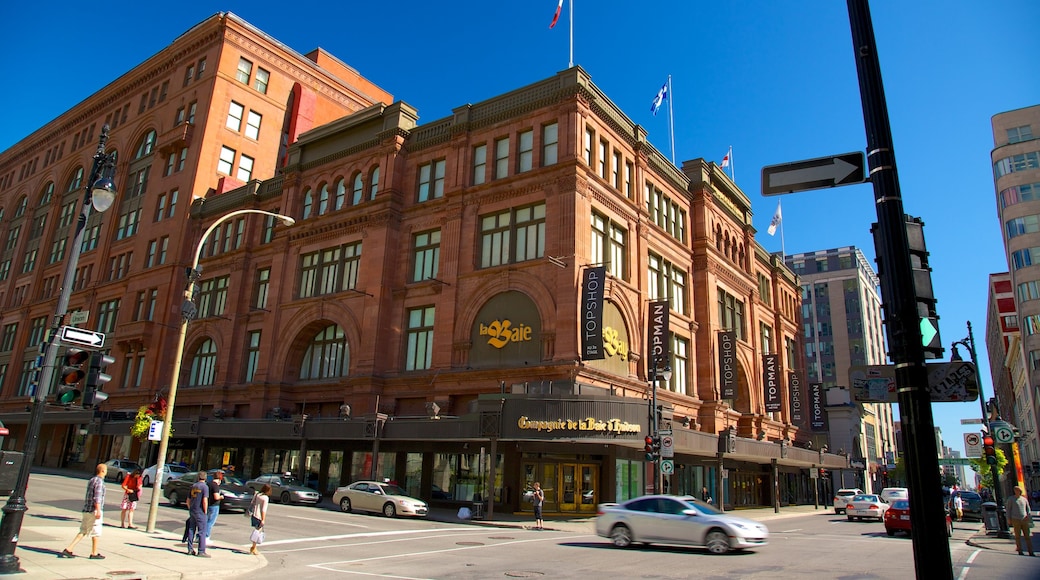 Downtown Montreal showing heritage architecture, a city and street scenes