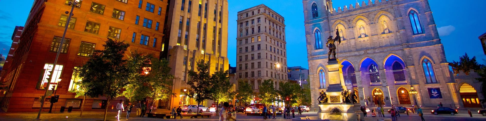 Notre Dame Basilica featuring a church or cathedral, religious aspects and a city