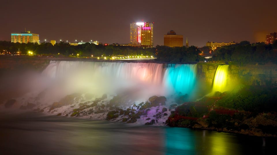 Niagara Falls ofreciendo una catarata y escenas nocturnas