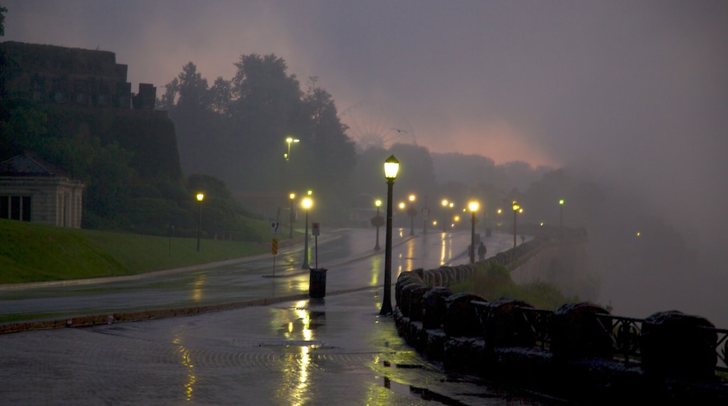 Ontario which includes a sunset, street scenes and mist or fog