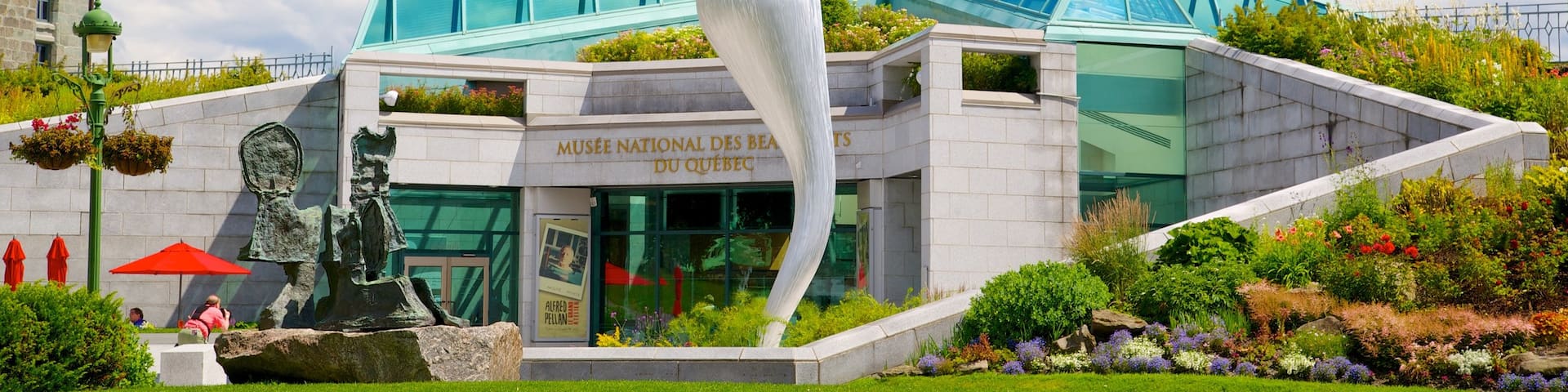 Battlefields Park showing a statue or sculpture, a city and modern architecture