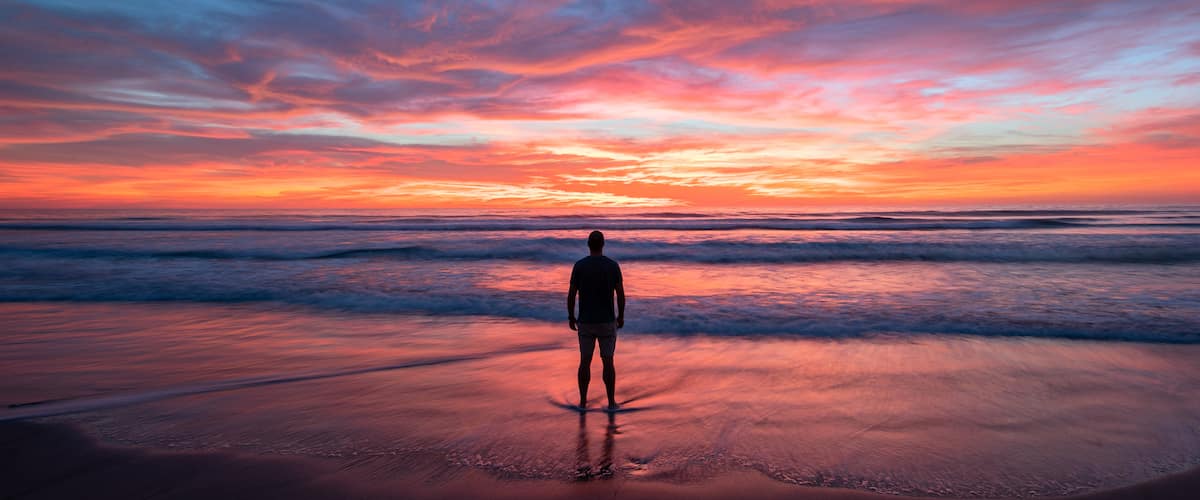 Torrey Pines State Beach featuring a sandy beach, general coastal views and a sunset
