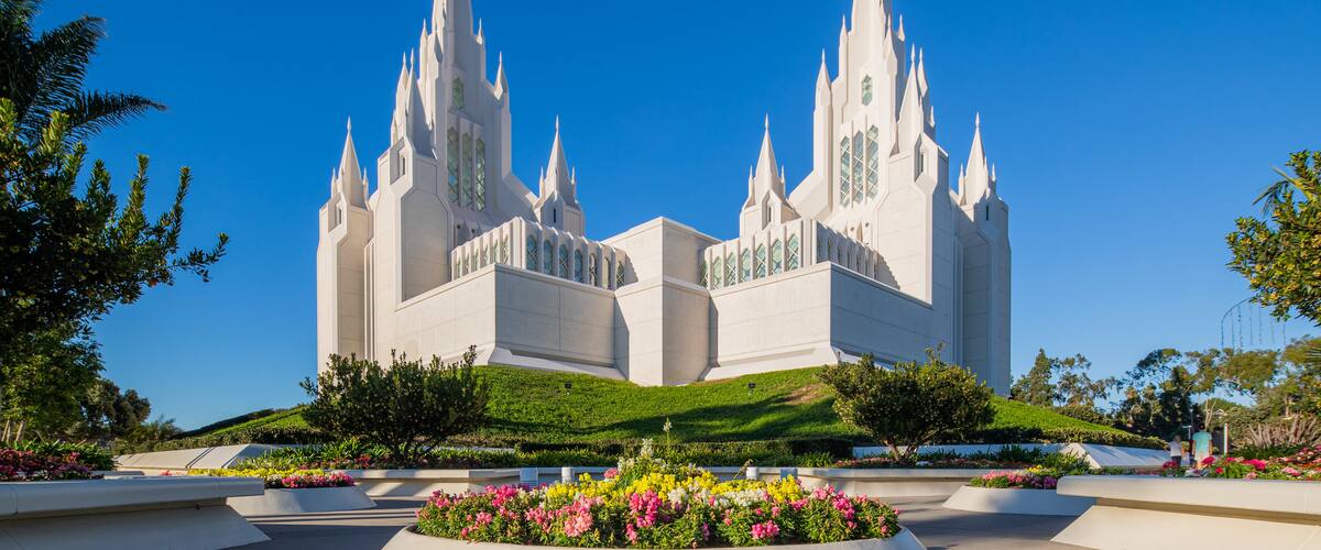 San Diego Mormon Temple featuring flowers, a park and a church or cathedral