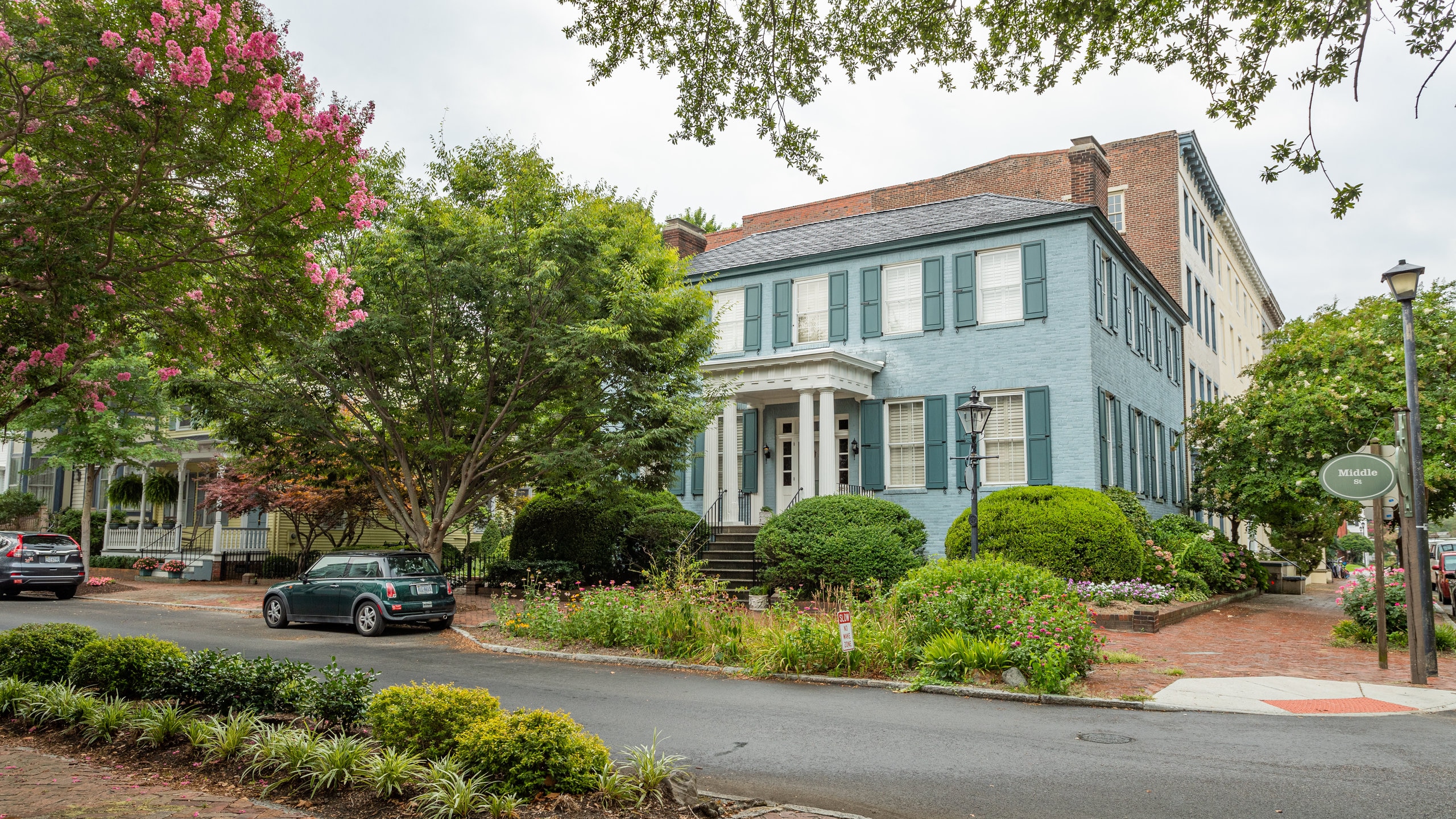 Portsmouth featuring a house and wildflowers