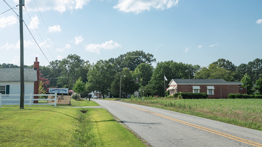 Carrollton featuring farmland and a small town or village
