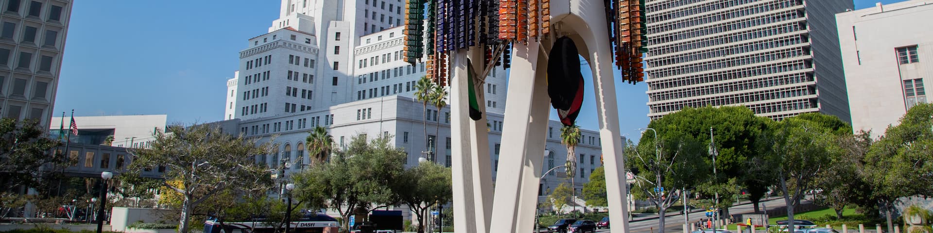 Little Tokyo which includes a skyscraper, a monument and outdoor art