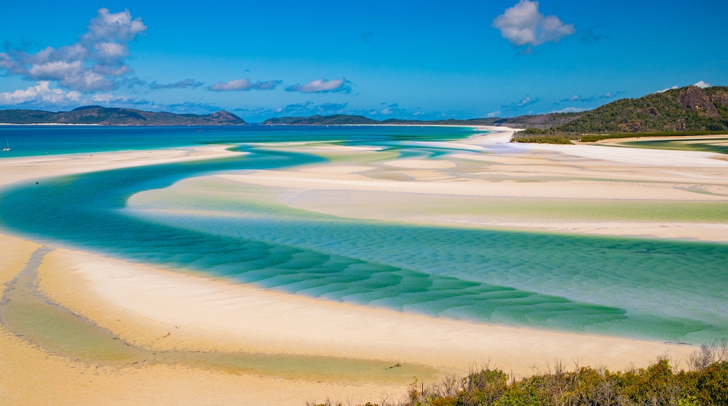 Whitehaven Beach showing a sandy beach, general coastal views and landscape views