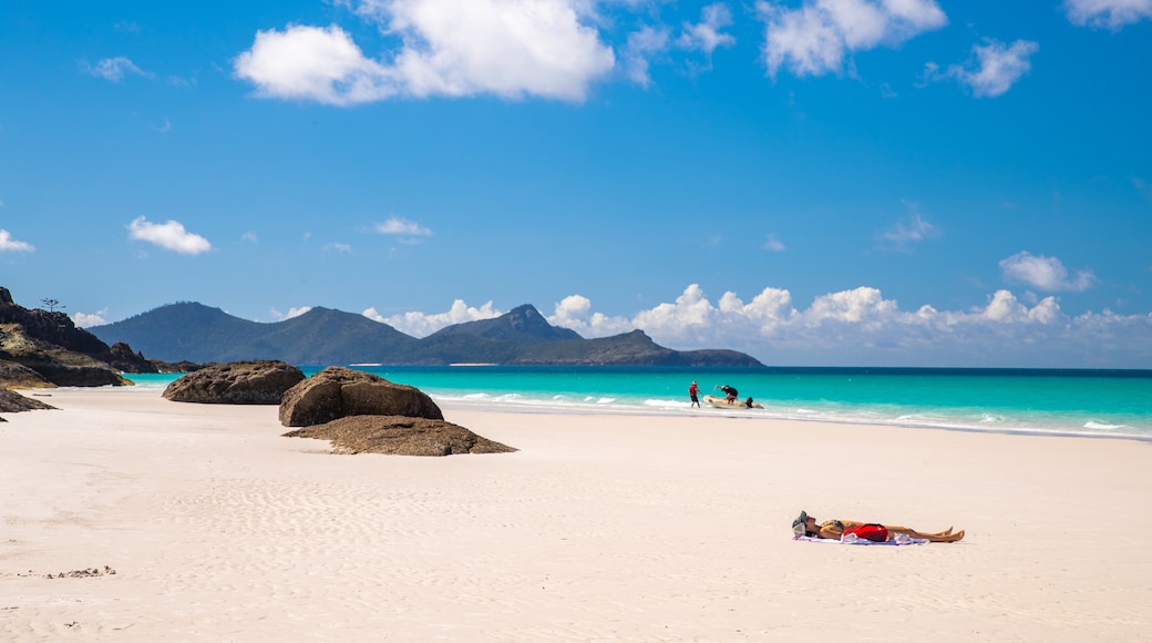 Whitehaven Beach showing general coastal views, a sandy beach and tropical scenes