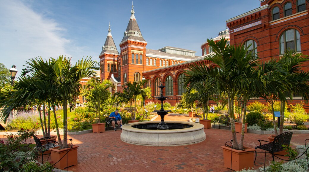 Arts and Industries Building featuring a fountain, a garden and heritage elements