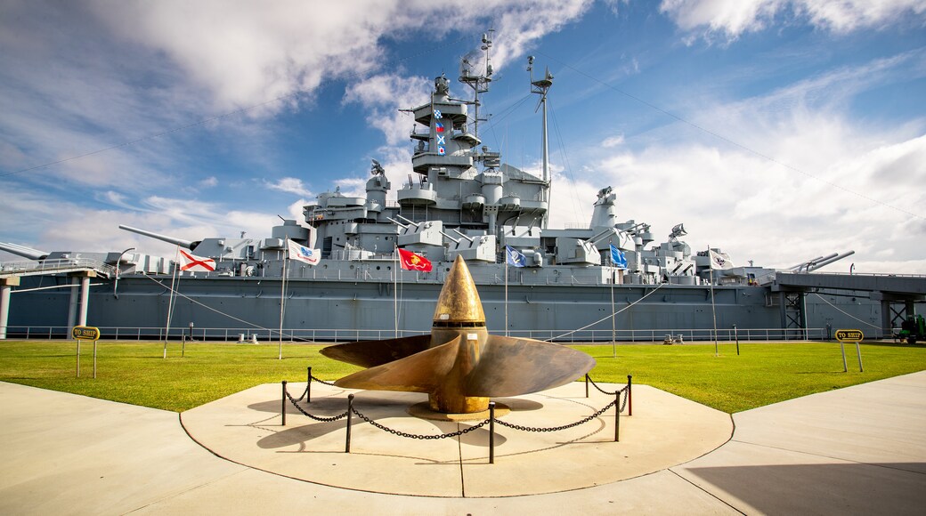 USS Alabama Battleship Memorial Park showing military items and a garden