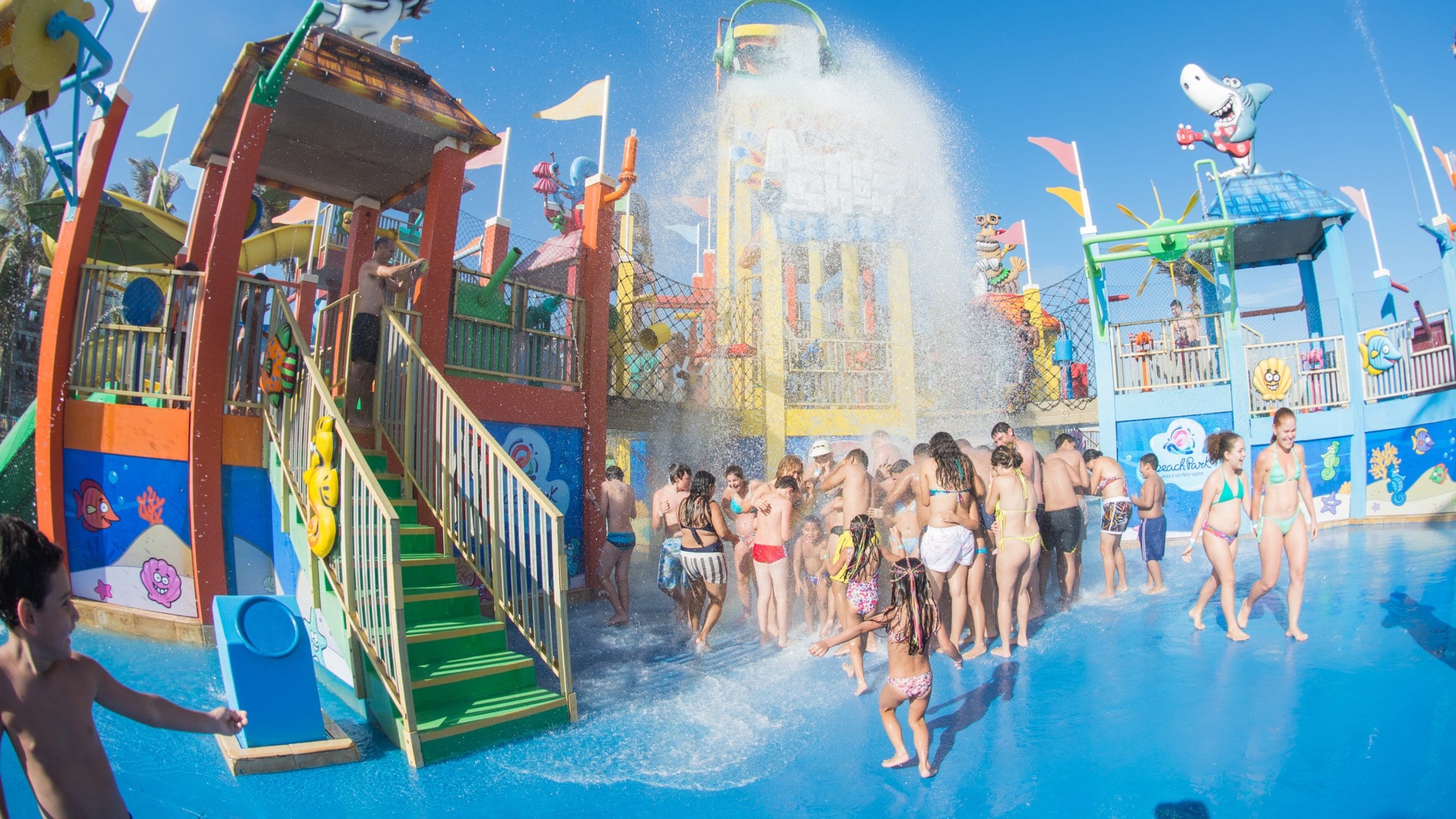 Beach Park Water Park which includes a waterpark as well as a large group of people