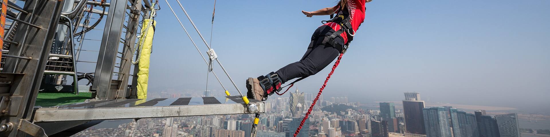 Macau Tower which includes a city and bungee jumping as well as an individual femail