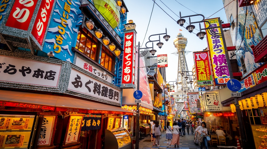 Tsutenkaku Tower featuring street scenes, cbd and signage