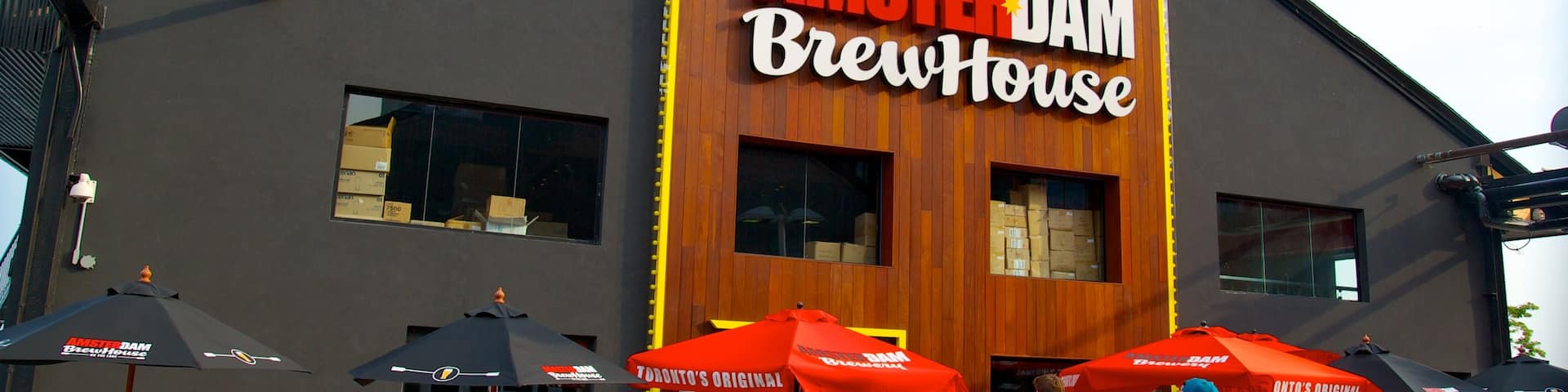 Harbourfront Centre featuring outdoor eating, a bar and signage