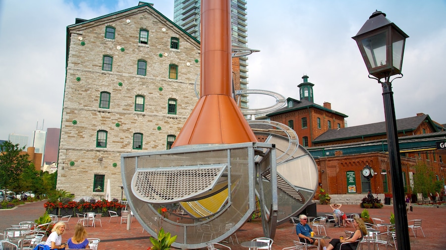 The Distillery Historic District which includes outdoor eating, a city and café lifestyle