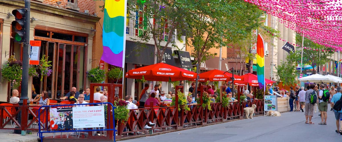 Gay Village featuring outdoor eating, café scenes and street scenes