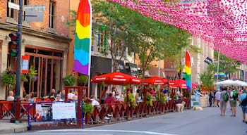 Gay Village mit einem Straßenszenen, Essen im Freien und Café-Lifestyle