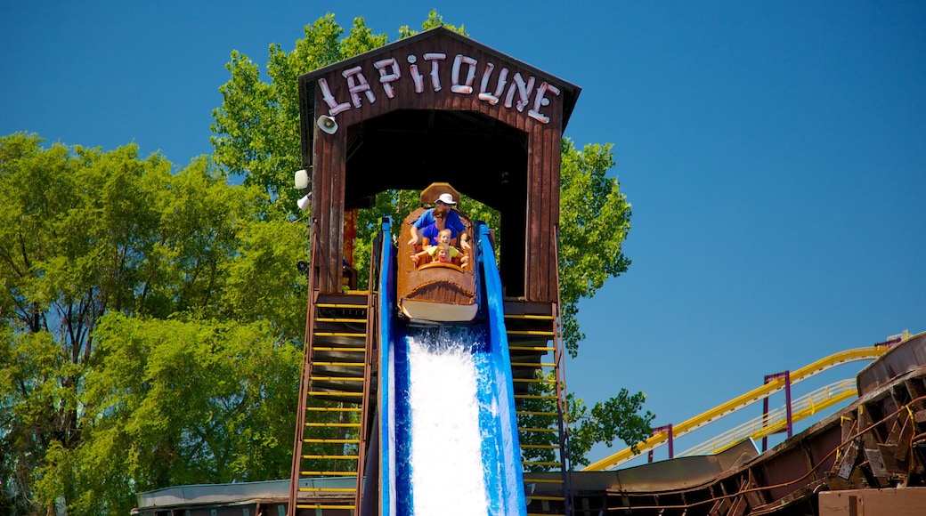 La Ronde Six Flags which includes signage, a waterpark and rides