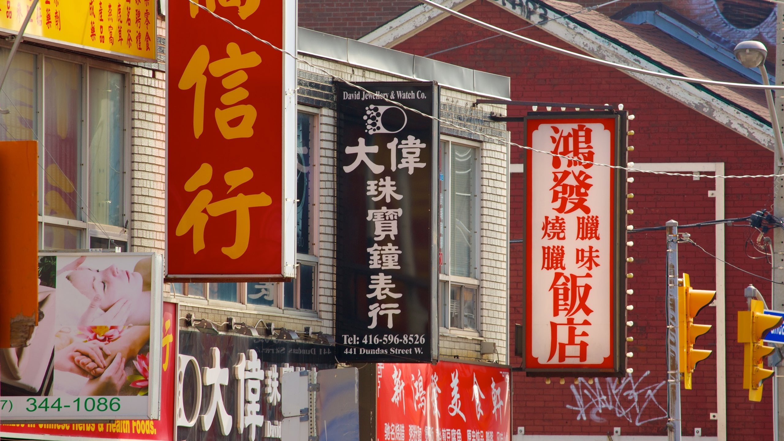 Chinatown showing signage and a city