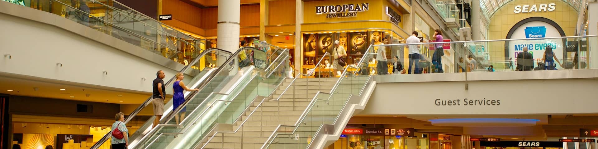 Toronto Eaton Centre showing interior views, shopping and signage